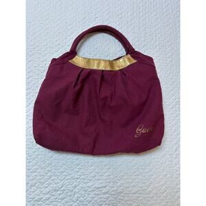 GUESS burgundy with gold embellishment handbag